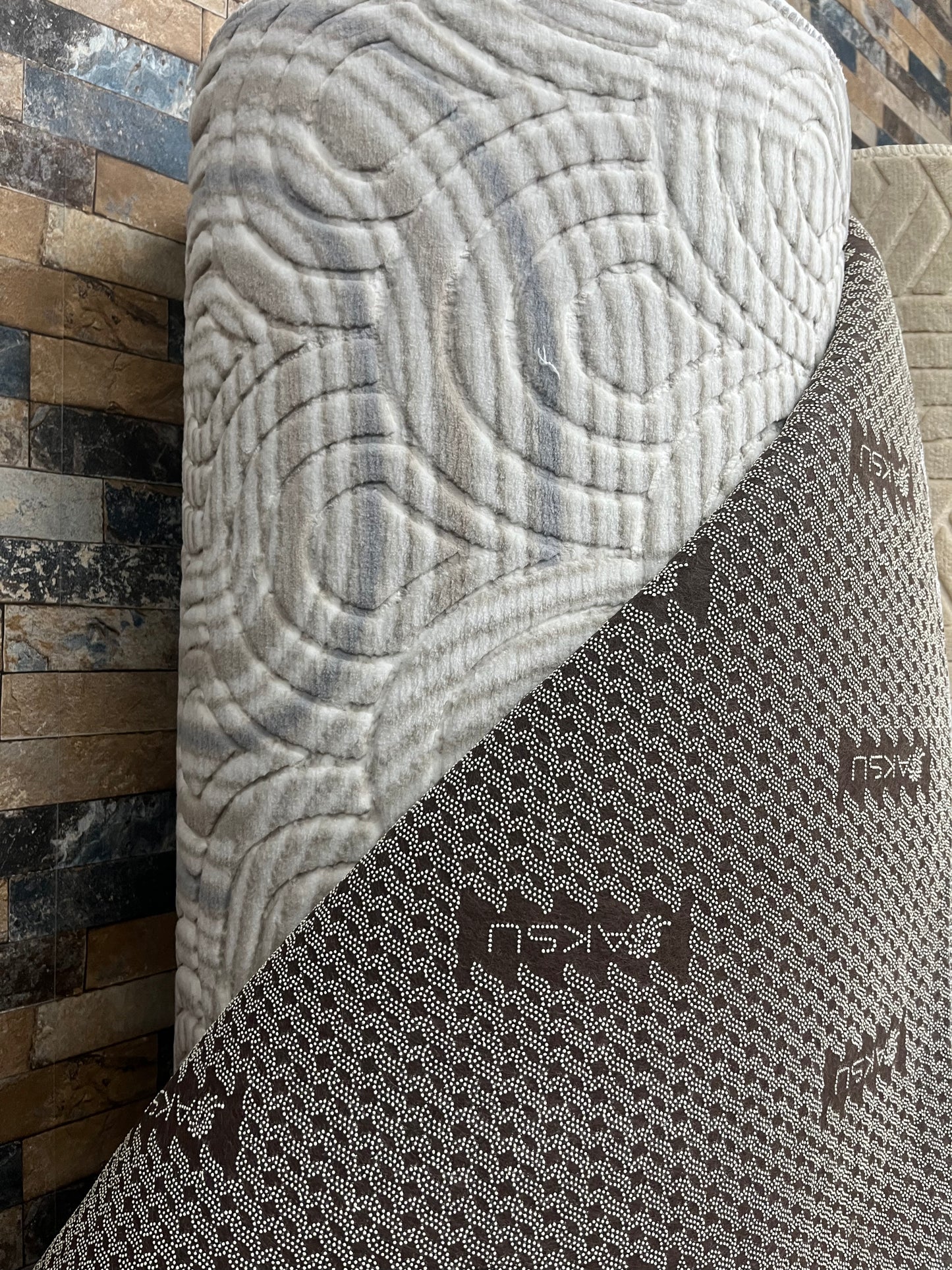 Tapis sur mesure "arc et vague" Ardasia